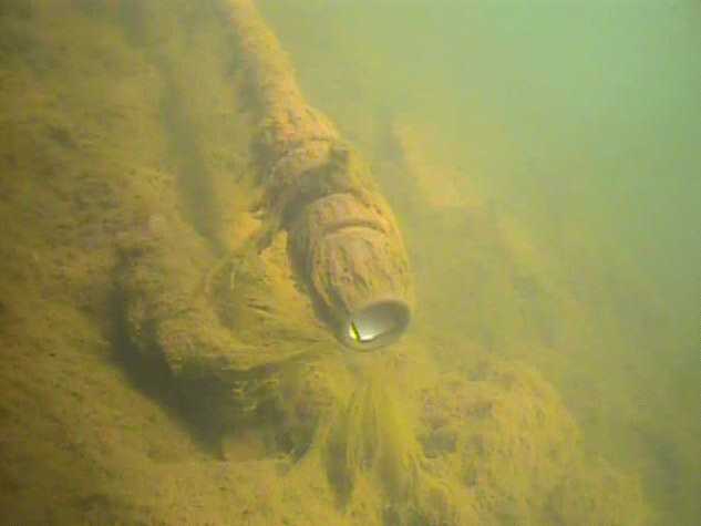 The siphon intake on the floor of the reservoir